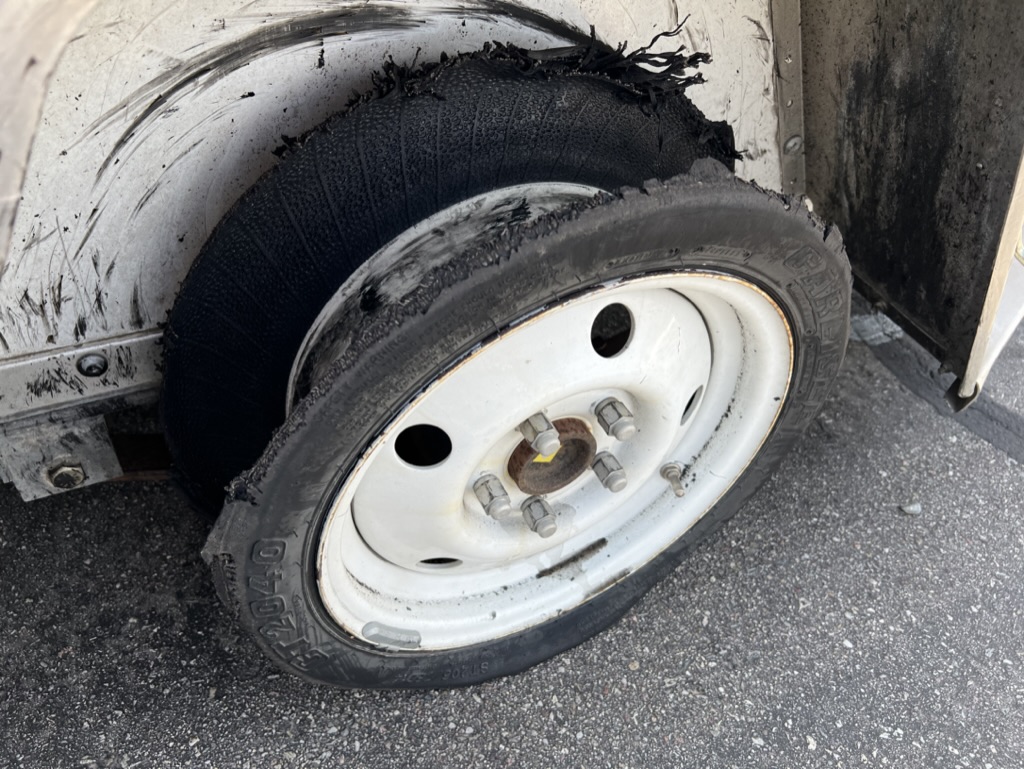 blown U-Haul trailer tire, coming into Phoenix, July 21, 2023.